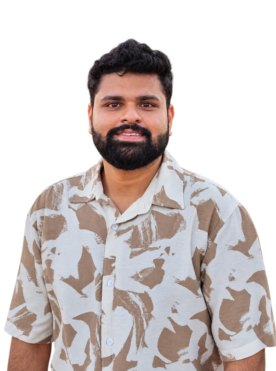 Swarnim Doegar, smiling, in a patterned short sleeve shirt